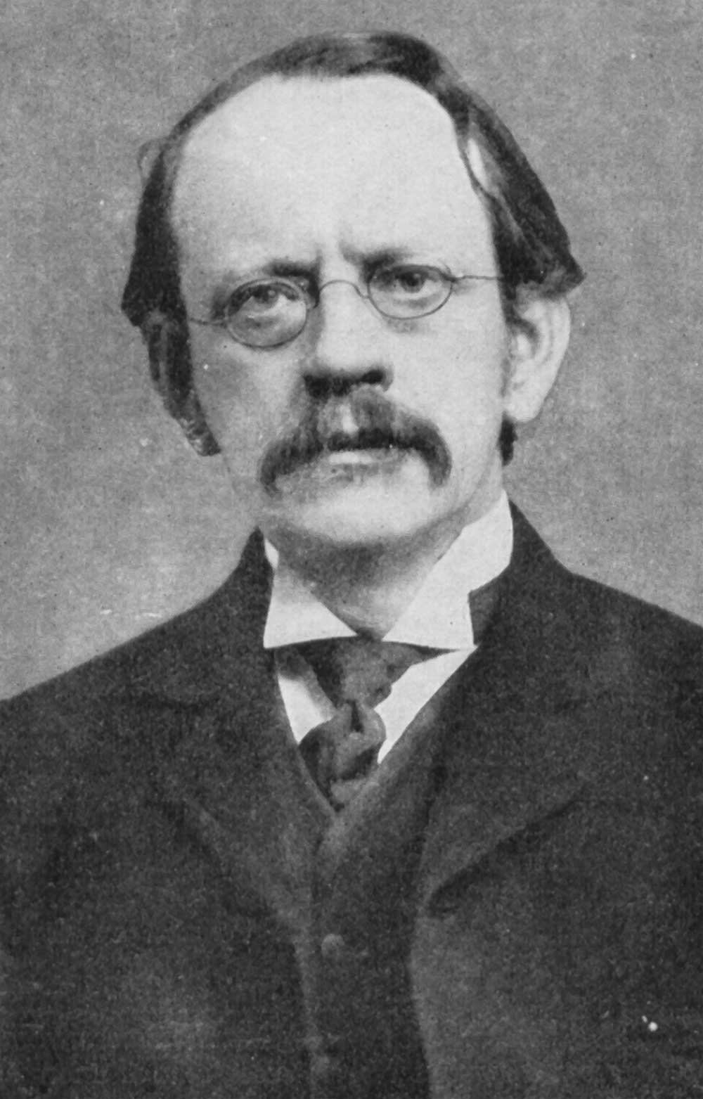 Black-and-white portrait of physicist J.J. Thomson.